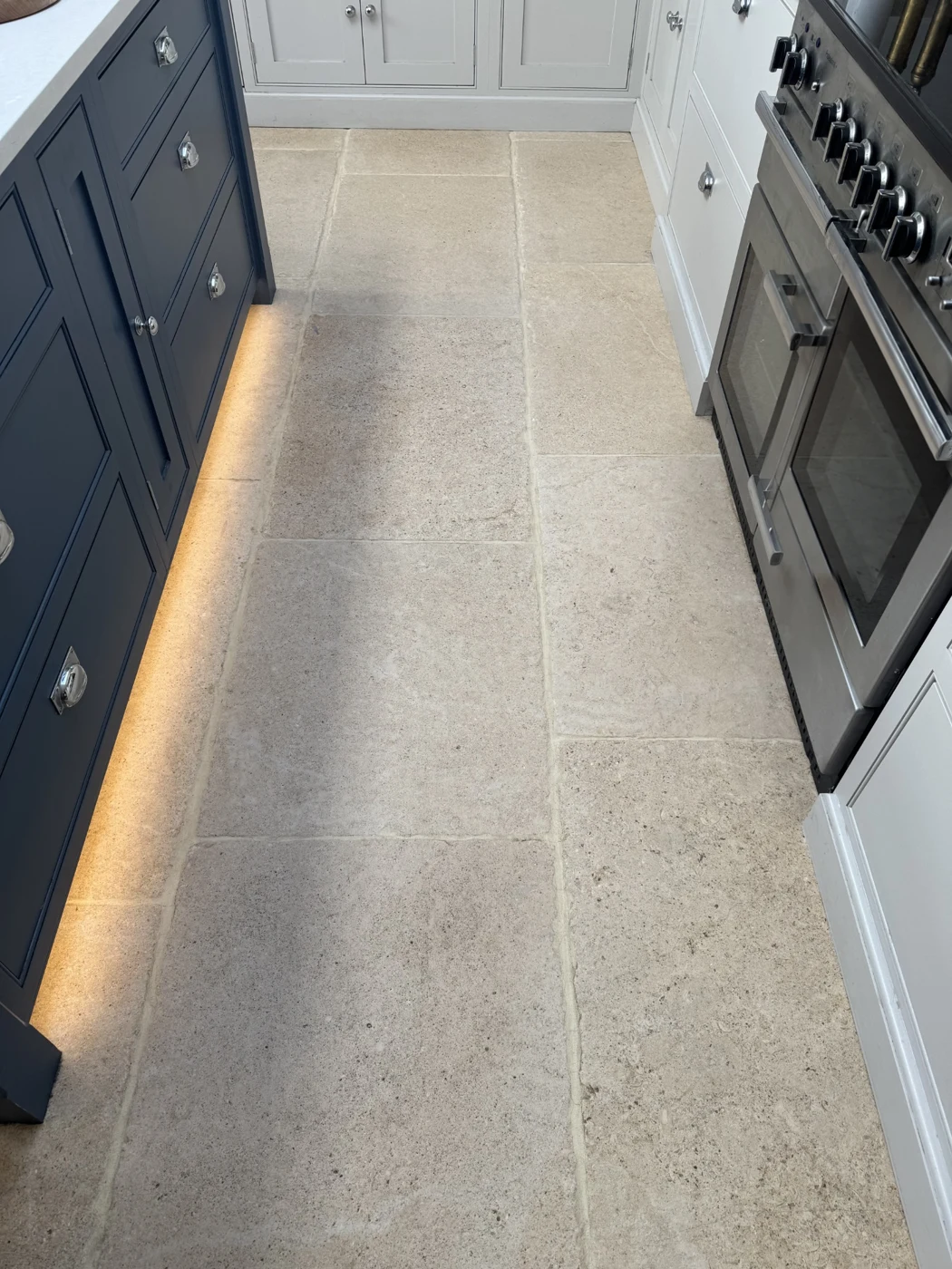 Kitchen floor restored by Damian, with a natural finish and lighter grout lines